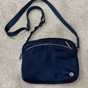 Navy 2.5L  Lululemon city adventurer bag